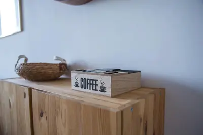 a box sitting on top of a wooden cabinet at Via Rocca House in Rome