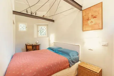 a bedroom with a bed in a room at Casa di NOAH in Rome
