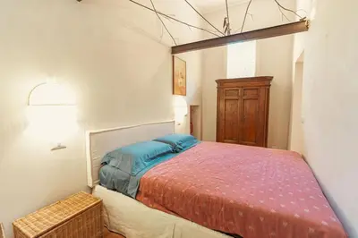 a bedroom with a bed in a room at Casa di NOAH in Rome