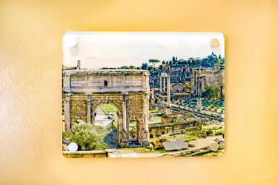 a picture of the colosseum and a city at Magikrooms Luxury in Rome