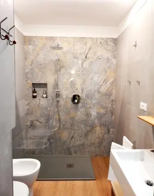 a bathroom with a shower and a sink at Domus Quintili Monti in Rome