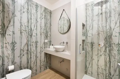 a bathroom with a toilet and a shower at Aventino Urban Place by One Up Hospitality in Rome