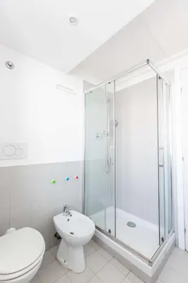 a bathroom with a shower and a toilet and a sink at Mini apartment Cairoli 2 - Zeno 42 in Rome