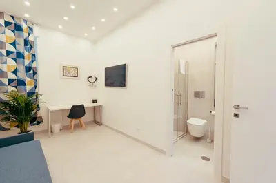a bathroom with a shower and a toilet at 30' Walk Vatican & Stadium Art, Smart Home in Rome