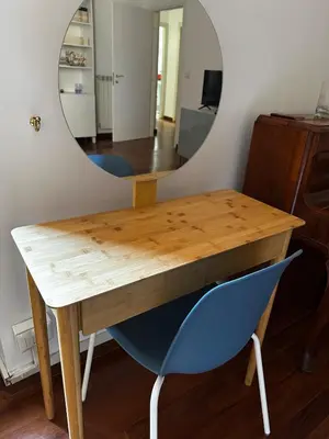 a dressing table with a mirror and a blue chair at Casa Letizia - Rome Prati Vatican - Intero appartamento in Rome