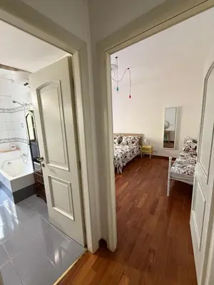 an open door to a room with a bathroom at Casa Letizia - Rome Prati Vatican - Intero appartamento in Rome
