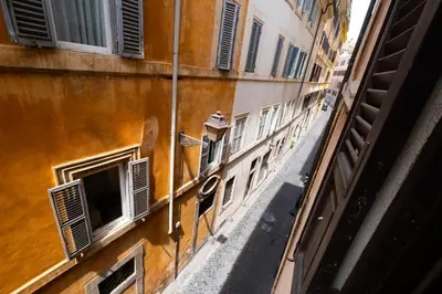 an overhead view of an alley with windows on a building at Trevi Room in Rome