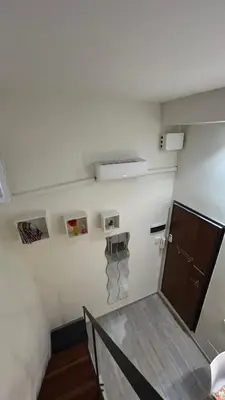 an empty room with a staircase and a door at Parioli Independent Room in Rome