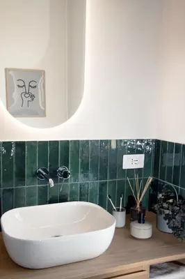 a bathroom with a white tub on a wooden counter at Beautiful Penthouse Roma in Rome