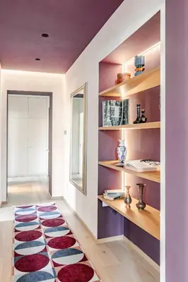 a room with a rug on the floor and shelves at Unique Piazza Navona 2 Bedrooms and Home Cinema in Rome