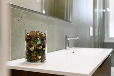 a bathroom with a toilet and a sink and a shower at Civico7 - Luxury Apartment in Rome