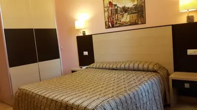 a hotel room with a bed in a room at Palma in Rome