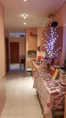 a kitchen with a counter with a christmas tree on it at Palma in Rome