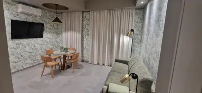 a living room with a couch and a table at Roma Suite Style in Rome