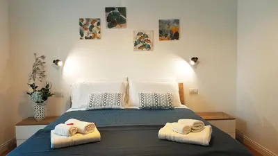 a bedroom with a bed with towels on it at B&B CasaBentivoglio in Rome