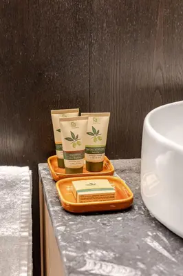 two cups of coffee on an orange tray on a counter at En-suite Bedroom Manin - 2 min walk to Termini Station in Rome