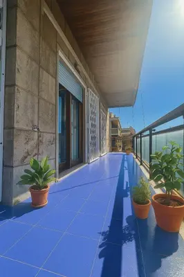 a building with potted plants on a patio at 85mq of Vintage Luxury-Near Vatican City WIFI AC in Rome