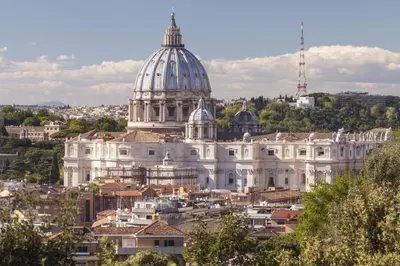 a large white building with a domed building at 85mq of Vintage Luxury-Near Vatican City WIFI AC in Rome