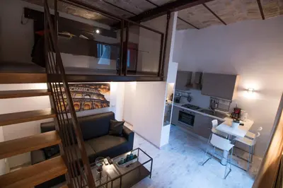 an overhead view of a living room and kitchen at Inner House in Rome