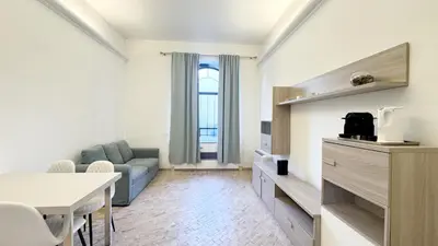 a living room with a couch and a table at Foro Romano Apartments C in Rome