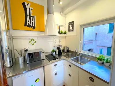 a small kitchen with a sink and a window at My Beauty Nest In The Historical Centre in Rome