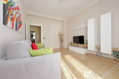 a room with stairs and a door and a stair case at Domus 68 - Apartment with terrace in Rome