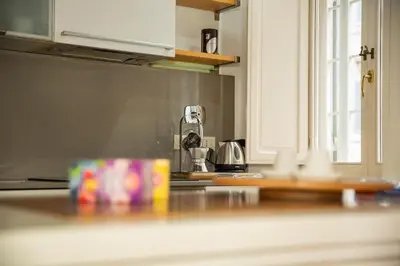 a kitchen with a counter top with a counter top at Tempietto del Carmelo in Rome