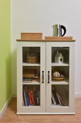 a white cabinet with books at Jubilee 4 Your home in Rome Vatican in Rome