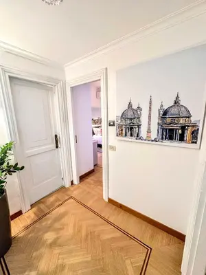 an empty room with a door with domes on the wall at Civico3 in Città Piazza del Popolo in Rome