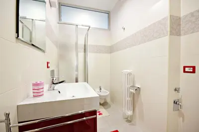 a bathroom with a sink and a toilet at B&B Clelia in Rome