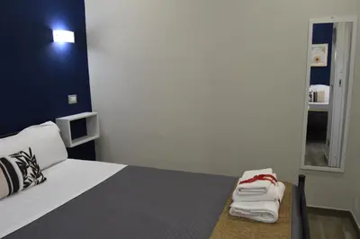 a hotel room with a bed with towels on it at Vatican Giulia in Rome