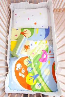 a white crib with four beds in it at Domus Aurea2 a stone's throw from the Colosseum in Rome