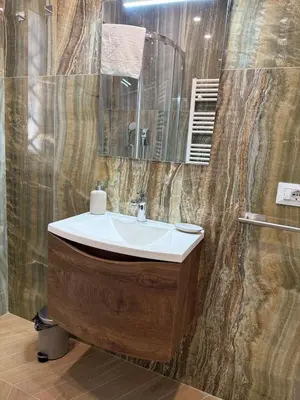 a bathroom with a sink and a mirror at Domus Battistini in Rome