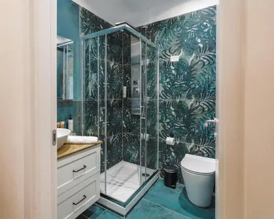 a bathroom with a shower and a toilet at Vatican LeM collection in Rome