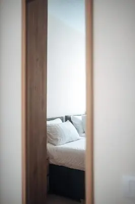 a bedroom with a bed and a window at Borgo Pio Suite Apartment in Rome