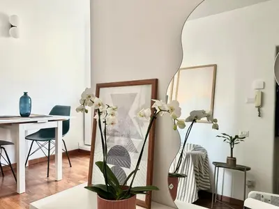 a living room with a couch and a table at Casa Mazz San Giovanni in Rome