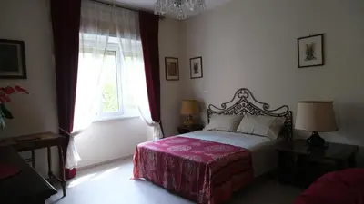a bedroom with a bed and a window at B&B Caput Mundi in Rome