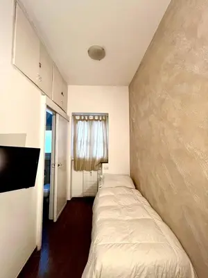 a small bedroom with a bed in a room at San Pietro APT near Vatican city Roma in Rome