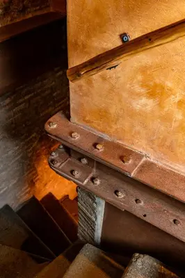 a close up of a piece of wood with a suitcase at Locanda da Enzo in Rome