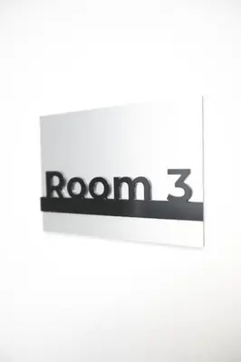 a sign with the word room on it at Unique Stay Tiburtina in Rome