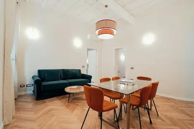 a living room with a table and a couch at Casa Mia Navona in Rome