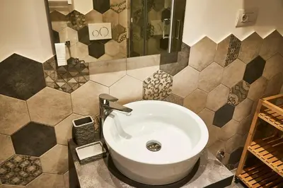 a bathroom with a sink and a shower at Ale & Niki's Home in Rome