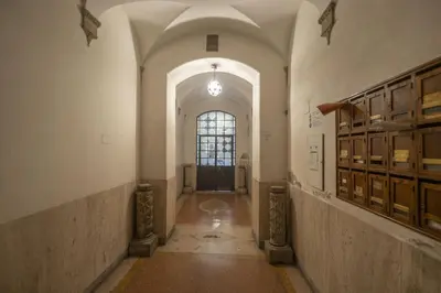 an empty hallway with a door in a building at Elegant Design Retreat by Campo de Fiori in Rome