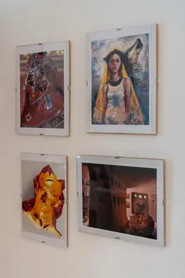 four pictures hanging on a wall in a museum at Villa Classical Roman Art - Monteverde with Garden in Rome