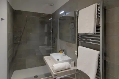 a bathroom with a sink and a shower at B&B Tiburtina Garden in Rome