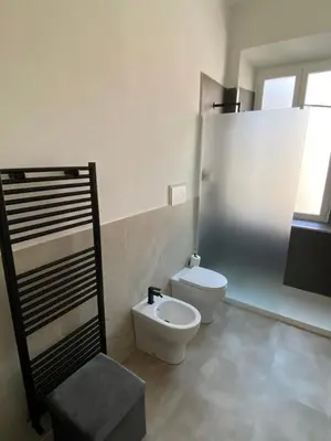 a bathroom with a toilet and a bidet at Casa Camillo in Rome