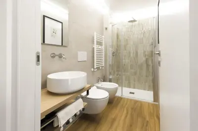 a bathroom with a sink and a toilet and a shower at Easylife - Charme, comfort e quiete vicino Termini in Rome