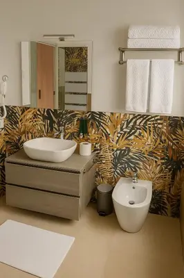 a bathroom with a sink and a toilet at 4 Seasons Roma Trastevere in Rome