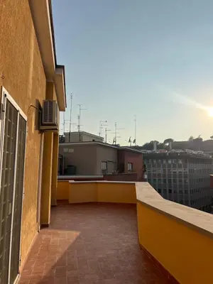 a view of a balcony of a building at F R Vatican view apartment in Rome
