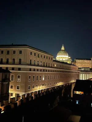 a large building with a domed building with a cathedral at Vatican Rooftop Studio - NEW OPENING in Rome